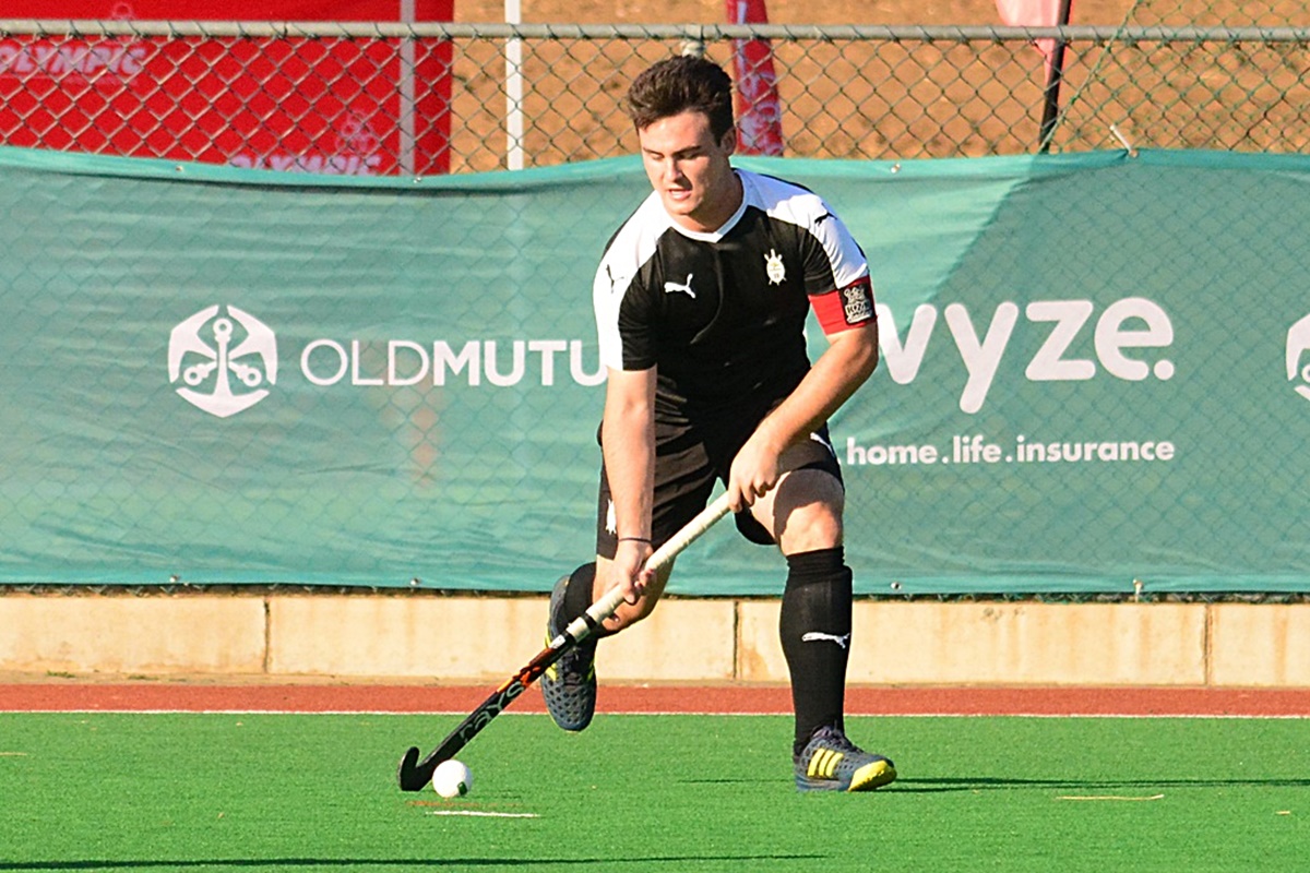 In action in the famous black and white of the KwaZulu-Natal Coastal team.