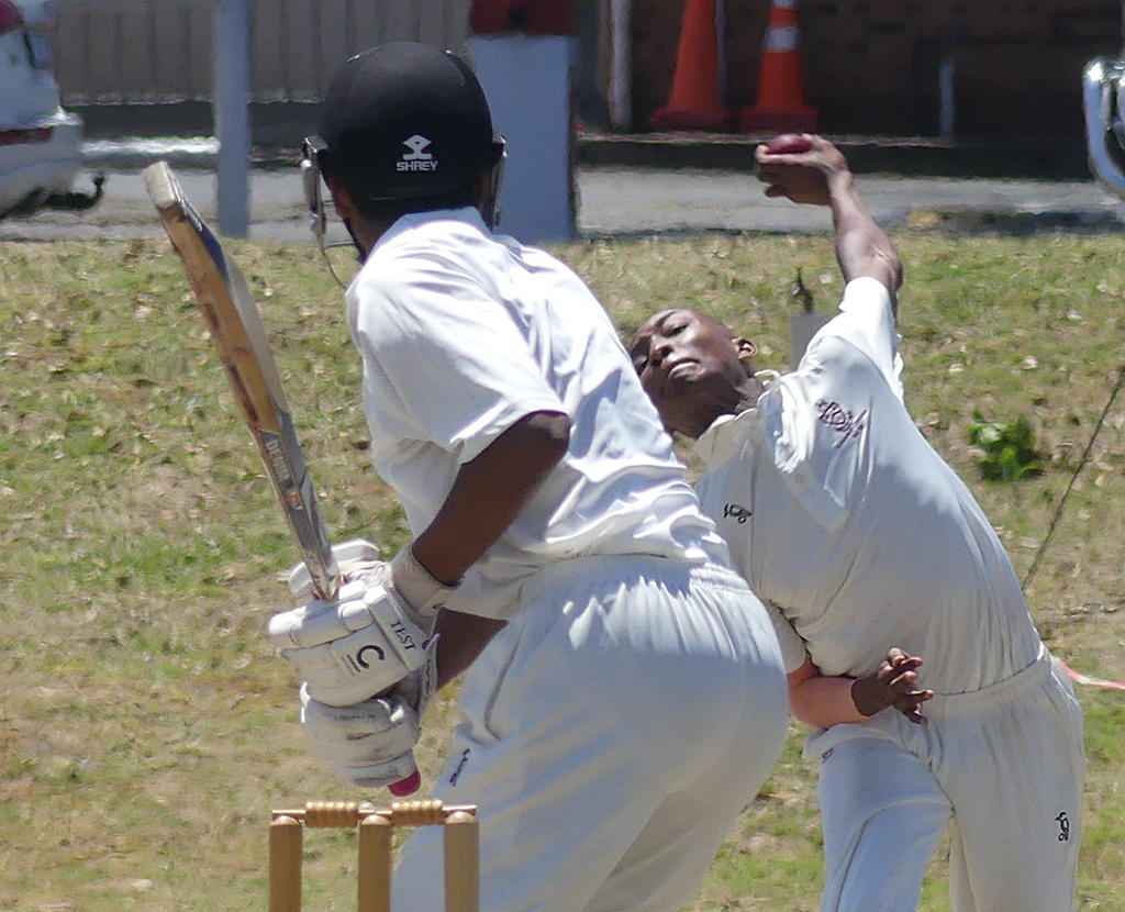 Dolphins' Khaya Majola Week bowler, Litha Gonya, of Kearsney, sends down a delivery to Clifton's Shiraz Perumal, who will also represent the Dolphins at the national week in Bloemfontein from 16-21 December. (Photo: Brad Morgan).