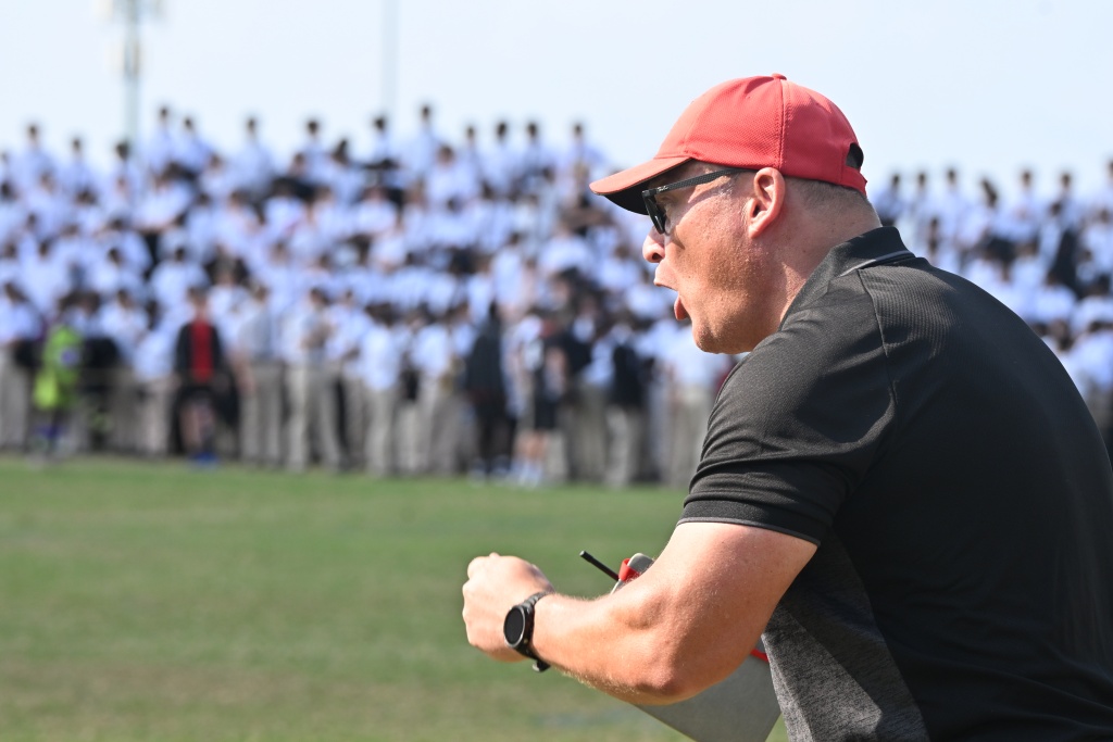 With the school roaring on the 1st XV, Clifton College coach, Jose Dos Santos, yells encouragement to his players. (Photo: Laurie Smith).