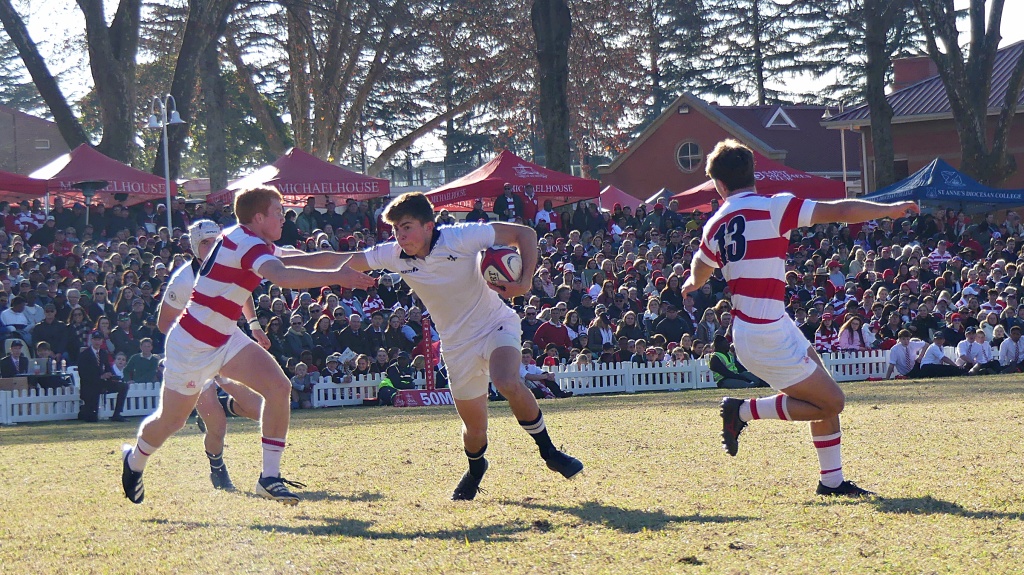 Ruan Mulder breaks the Michaelhouse defensive line on his way to scoring a try for Hilton College. (Photo: Brad Morgan).