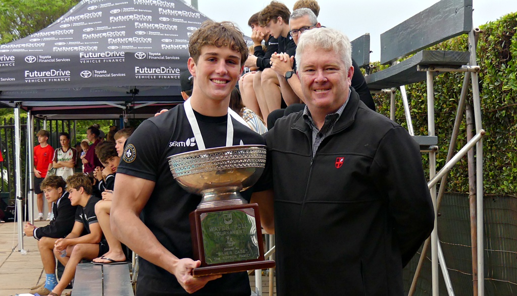 Clifton College's Executive Headmaster, Adam Rogers, presented the winner's trophy to Hilton College captain Andrew Schnell. (Photo: Brad Morgan).