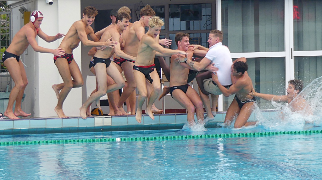 Clifton College's 1st team enjoyed celebrating their title win with the traditional champion's plunge into the pool. (Photo: Brad Morgan).